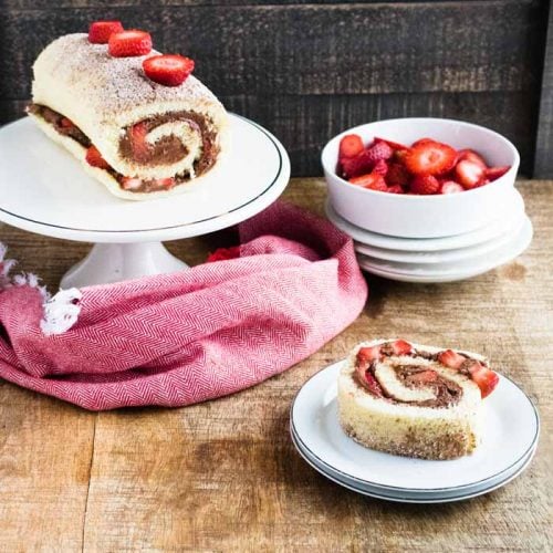 roll cake with chocolate and strawberries