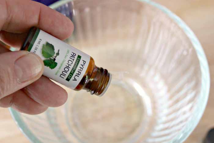 Add oils to essential oil natural bug spray recipe