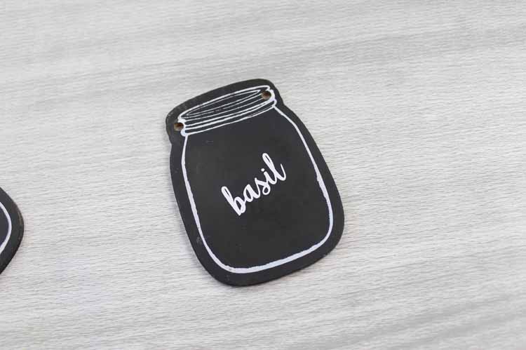 putting vinyl word on a mason jar tag