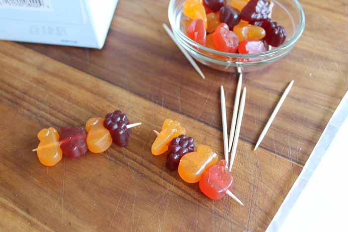fruit snacks added to a toothpick