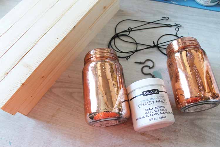 copper mason jars on a table