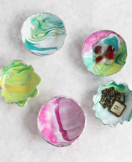 Learn how to make a trinket dish from oven bake clay! These marbled ring bowls make a great gift idea and are perfect for mom!