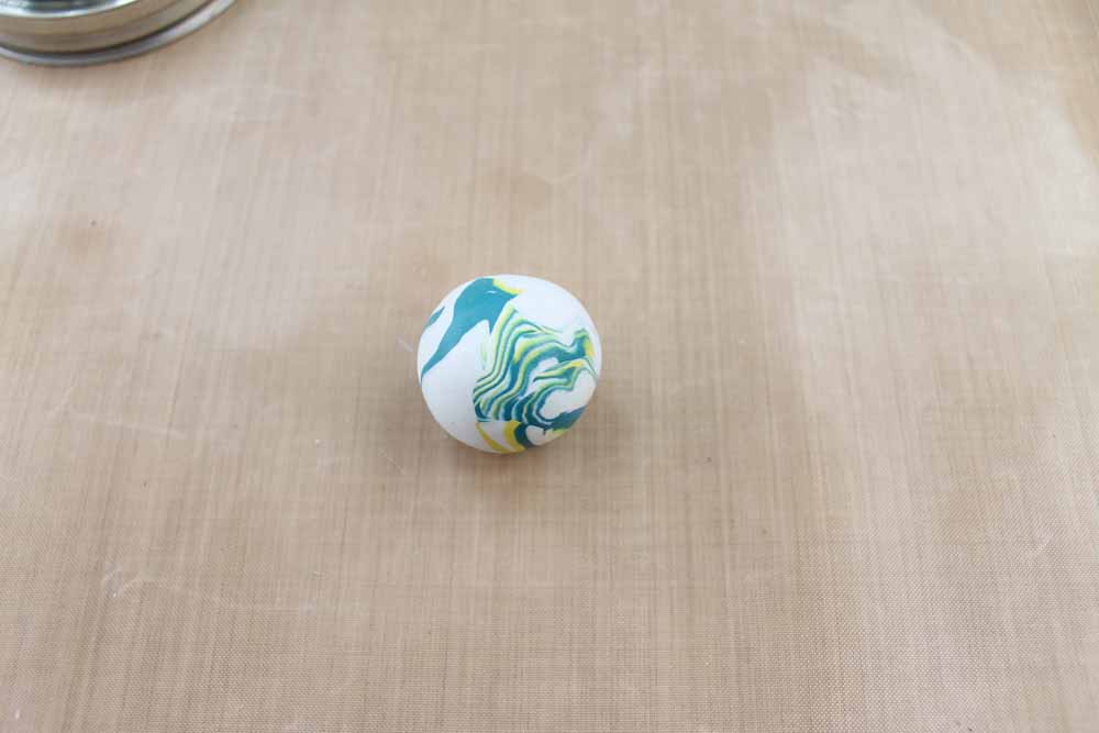 Roll the clay in a ball to create a marbled effect.