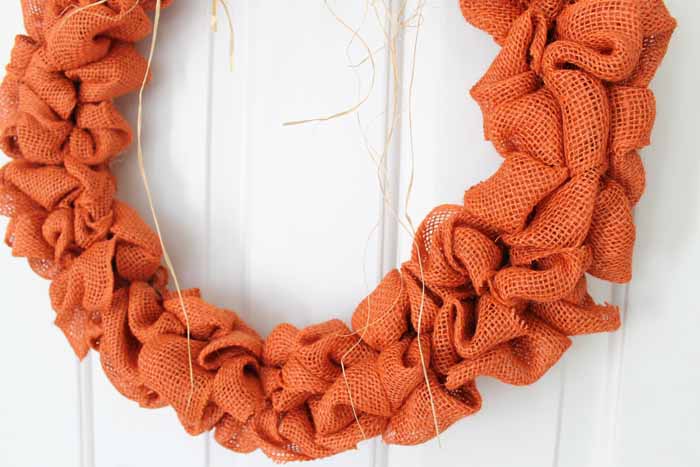 orange burlap on wreath form