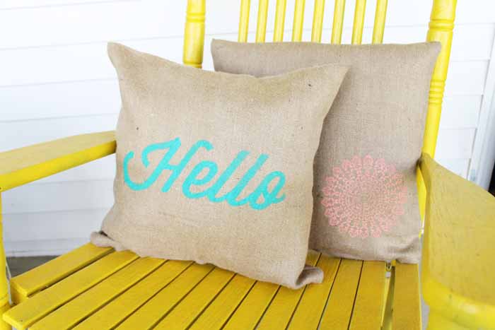 hello stenciled on a burlap pillow case