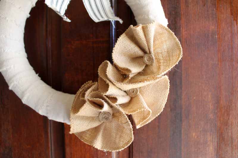 burlap flowers with button centers on a wreath