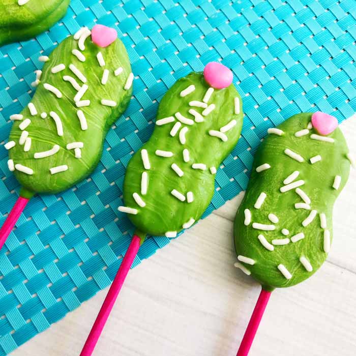 cactus cookies with white sprinkles and pink candies