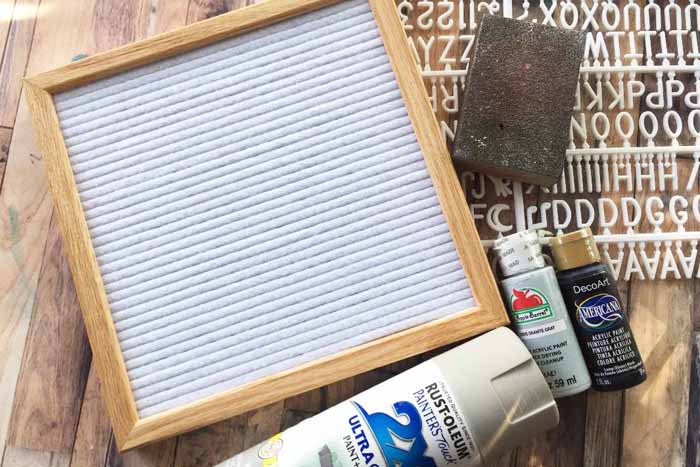 letter board with paint on a table