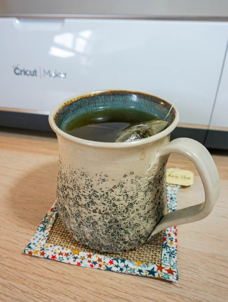 coffee mug on a burlap mug mat