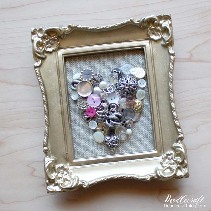 button heart on burlap background