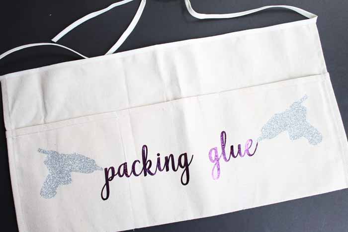 packing glue heat transfer vinyl on an apron