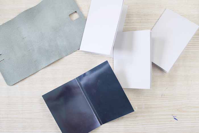 Fold all your notebook pieces, including the paper inserts and front and back cover support