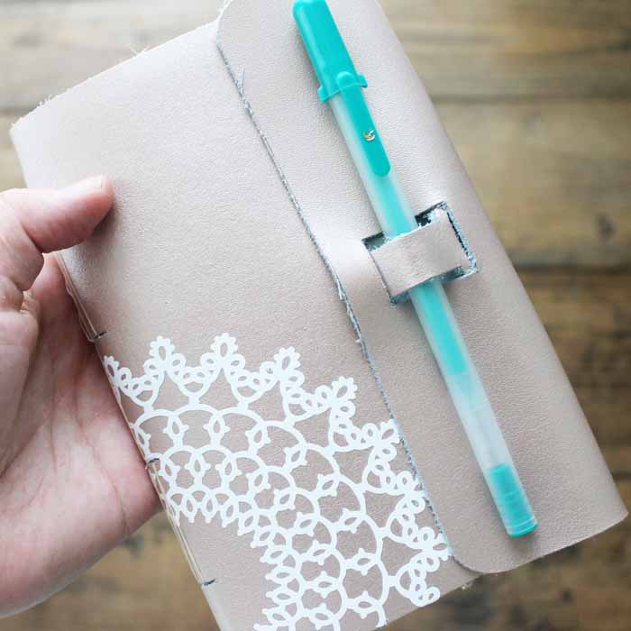 This DIY leather journal would make a great gift for someone who loves writing or journaling