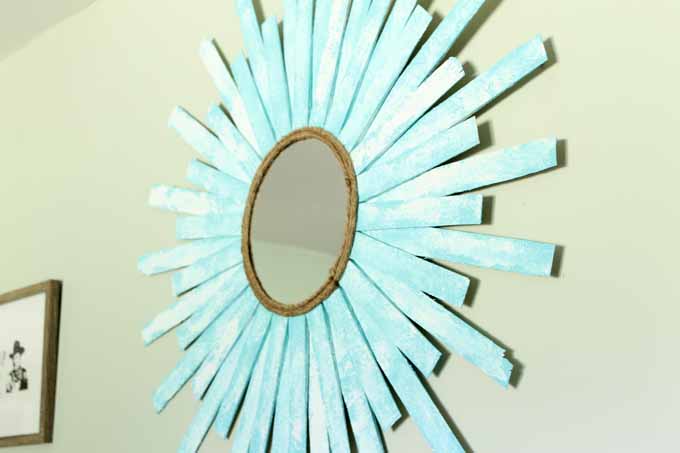 DIY beach paint finish on a starburst mirror