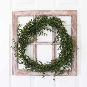 Make a farmhouse window and add a wreath for a decorative touch to any room! Love this rustic farmhouse style craft project!