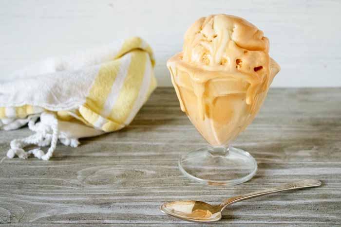 homemade ice cream and a spoon on a table