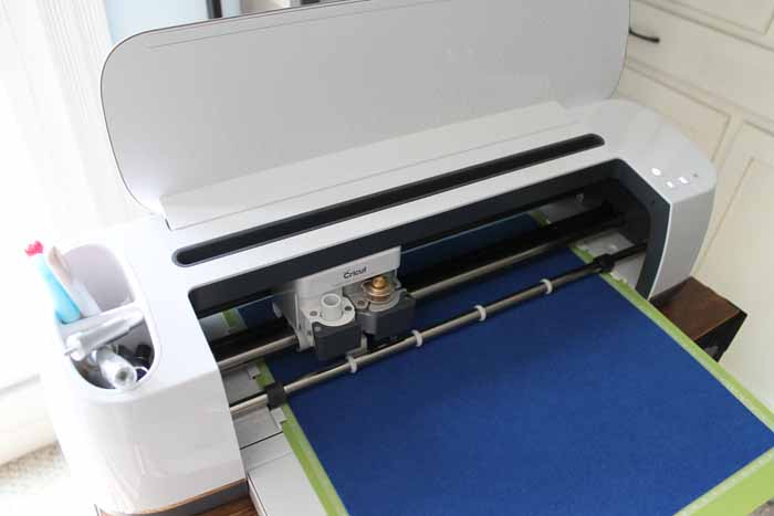 cricut maker cutting blue felt