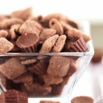 You will love this muddy buddy recipe with Reese's peanut butter cups! This is a great dessert the whole family will love! Chocolate and peanut butter all in one puppy chow recipe!