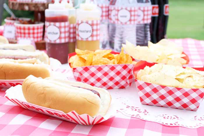 I love these picnic style containers that are perfect for serving chips and hot dogs at your build-your-own hot dog bar