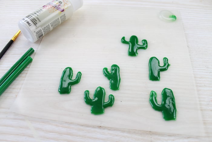 cactus shapes from hot glue on a non-stick mat