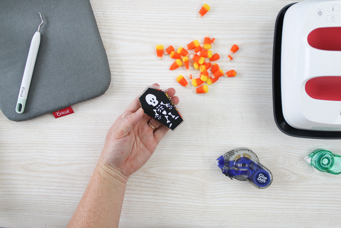 adding skeleton to the font of a coffin treat box