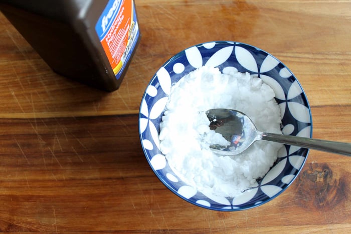 mixing grout cleaner in a bowl