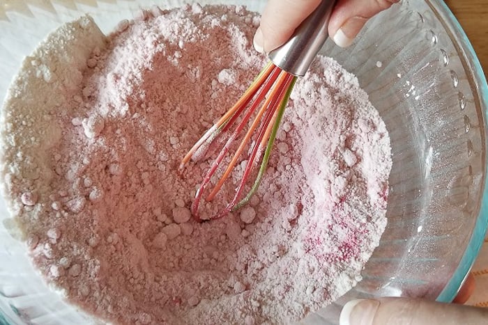 bath bomb ingredients mixed in a bowl