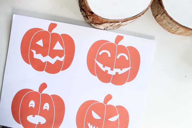 printed pumpkin faces on paper