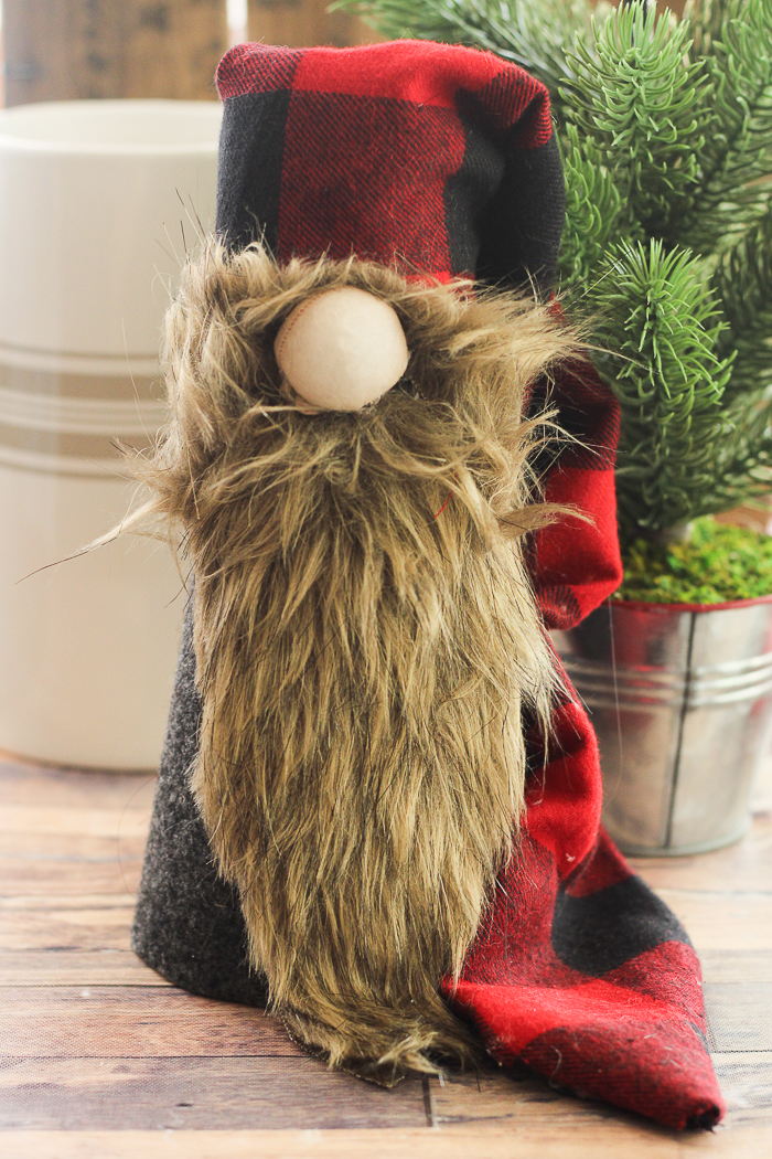 Make a Christmas gnome for your holiday decor this year! This Scandinavian gnome is perfect for your farmhouse Christmas! #gnome #scandinavian #christmas