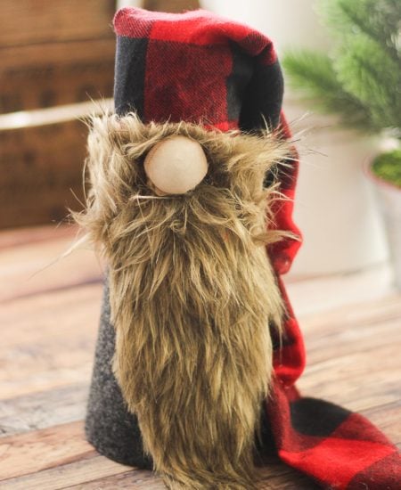 Make a Christmas gnome for your holiday decor this year! This Scandinavian gnome is perfect for your farmhouse Christmas! #gnome #scandinavian #christmas