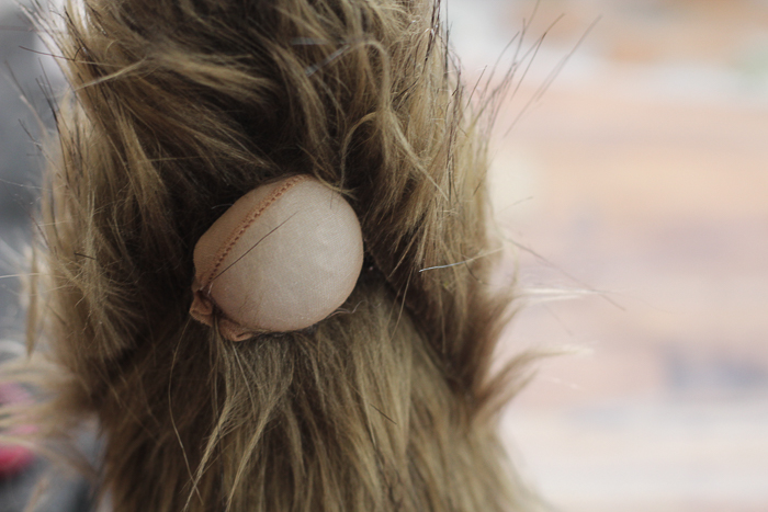 Secure the nylon ball to the beard of your Christmas gnome for a cute little nose