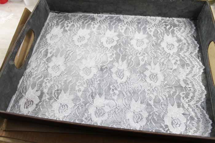 adding decoupage over lace on the bottom of a metal tray