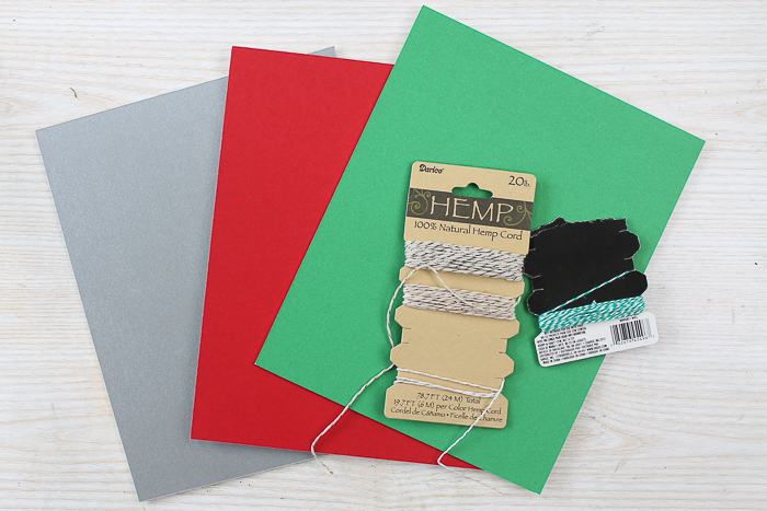 Supplies to make frame ornaments including mat board.