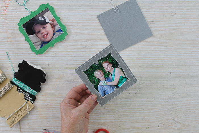 Adding picture to a frame ornament.