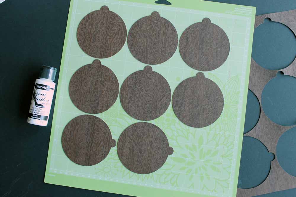 Cutting handmade ornaments on the Cricut machine.