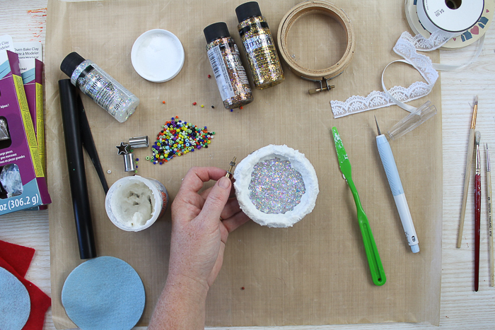 Fake snow and Glitterific paint on a Christmas ornament