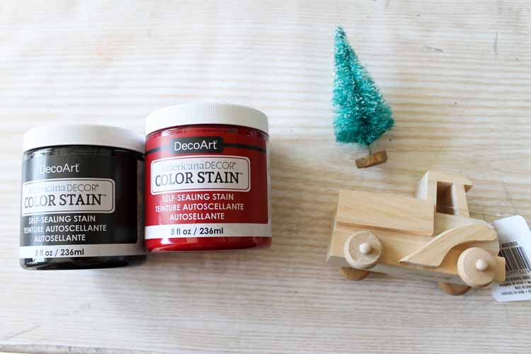 supplies to make a wood truck into a Christmas ornament 