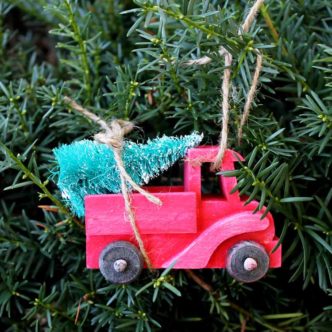 Make this red truck with Christmas tree ornament for your Christmas decor! A great addition to any farmhouse style tree! #christmas #christmasornaments #farmhousestyle