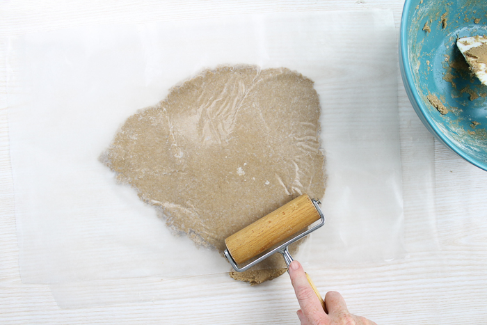 rolling out gingerbread batter