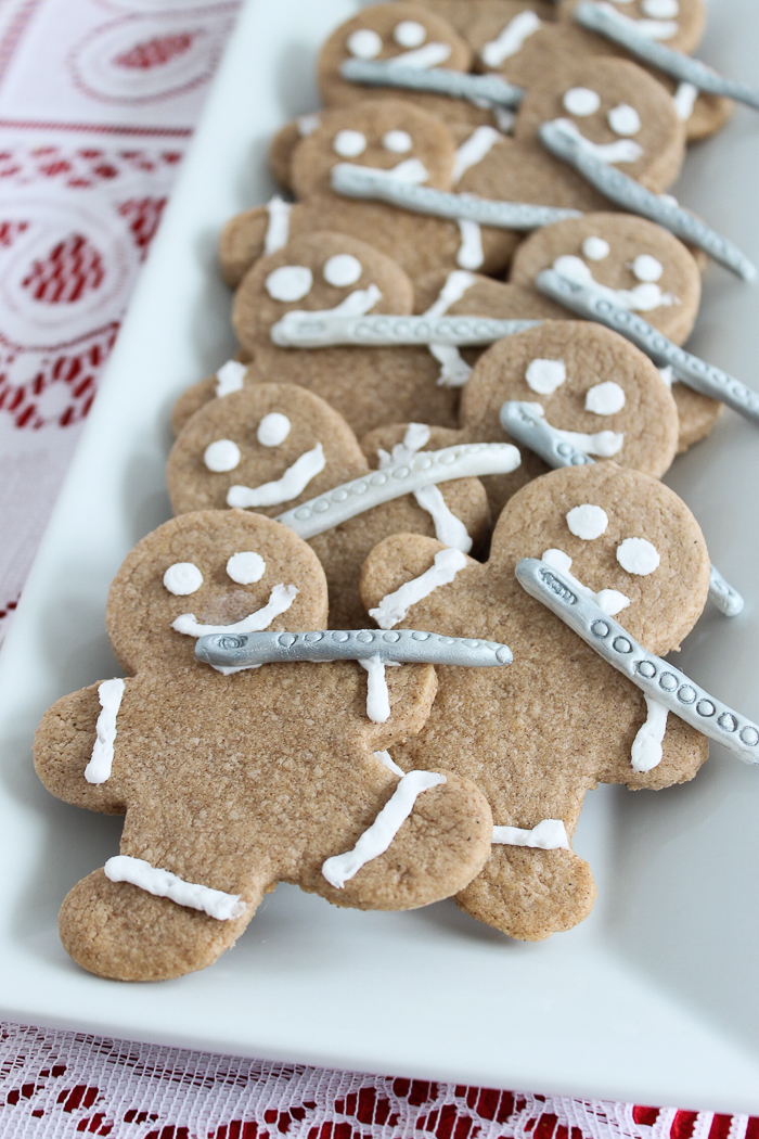 A close up of a plate of cookies, with Gingerbread