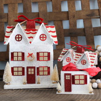 Learn how to make a gift box with your Cricut machine! A great way to wrap those Christmas gifts! A Christmas house makes a great gift wrap idea! #cricut #cricutmade