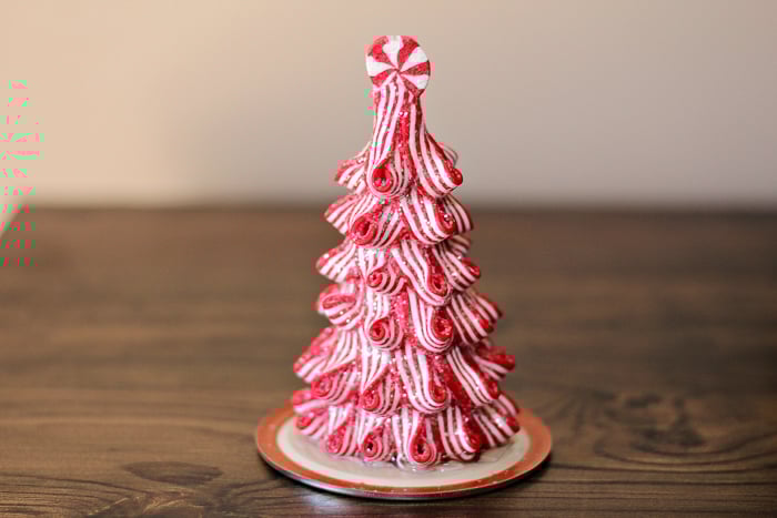 Easy DIY Snow Globe mason jar lid with christmas ornament on top