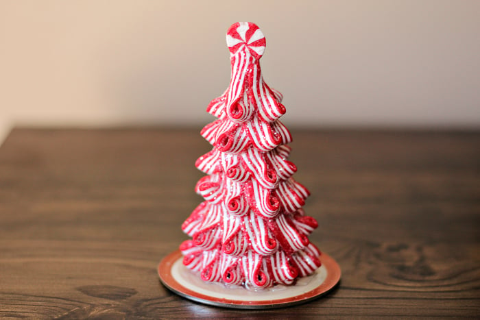 mason jar lid with christmas ornament on top