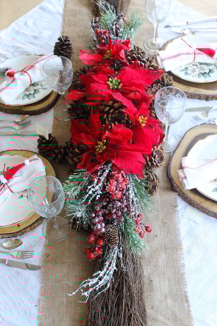 poinsettia and pine cone christmas centerpiece