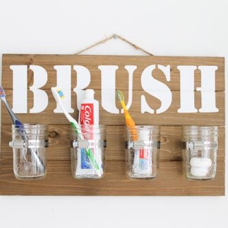 mason jar wall decor to organize a bathroom