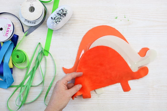 Cutting dinosaur shapes with a Cricut