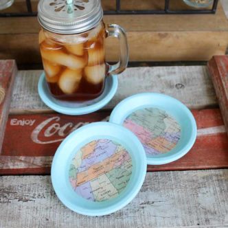 A simple tutorial for how to make coasters with maps and resin! Turn terra cotta saucers into the best coasters for your home! #coasters #maps #resin #crafts