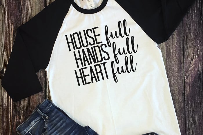 black and white baseball style shirt with cricut design that says "house full hands full heart full"