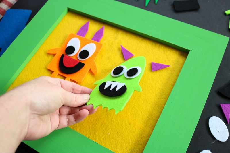 adding pieces to felt board