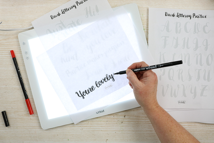 brush lettering practice using the Cricut BrightPad